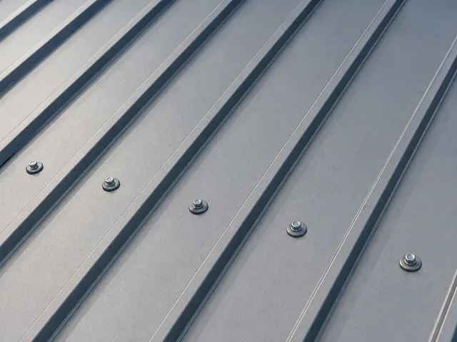Exposed-fastener metal panel roof surface