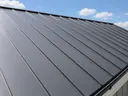 Standing seam metal roof surface